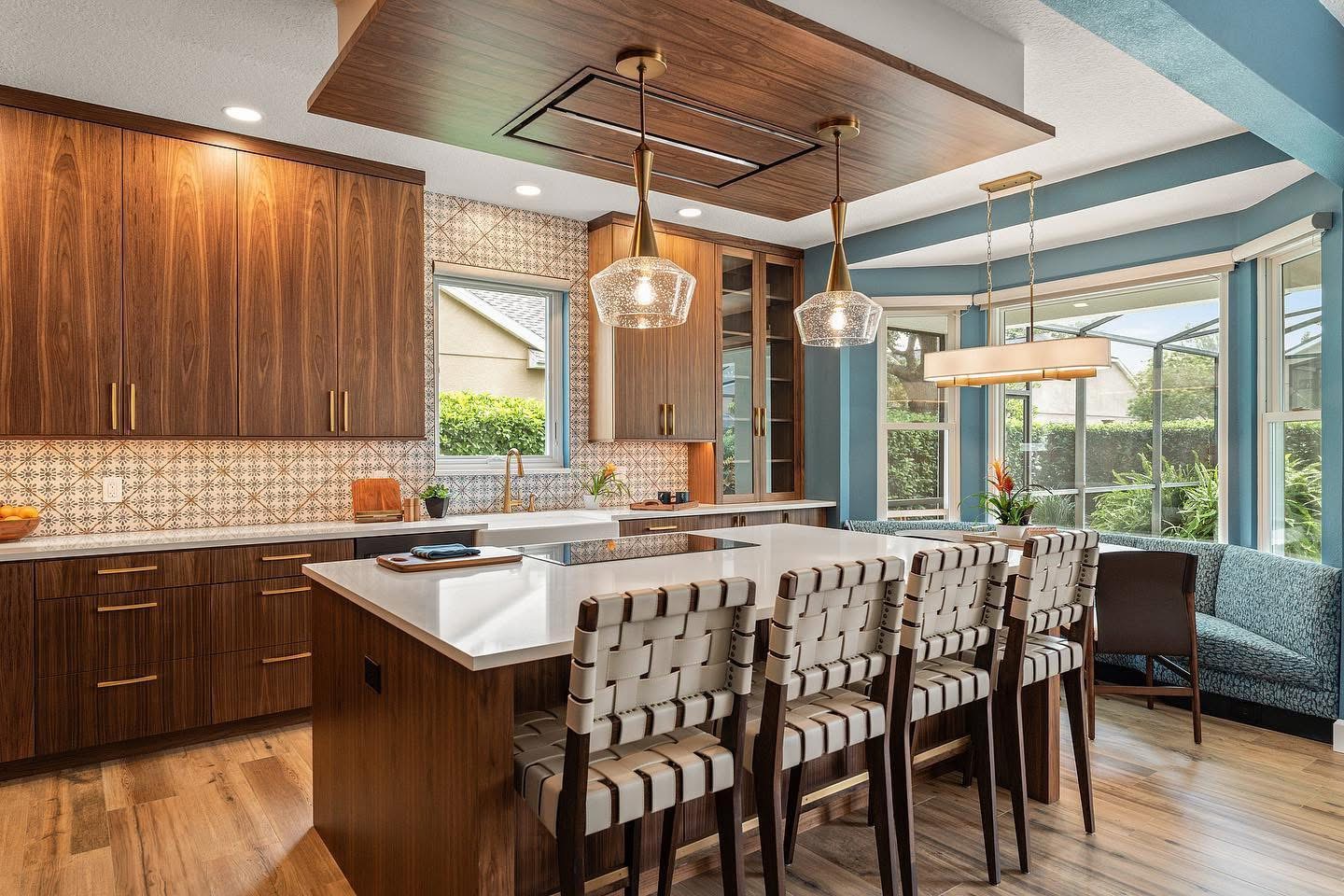 Kitchen remodel with walnut cabinets, pendant lighting, and breakfast nook